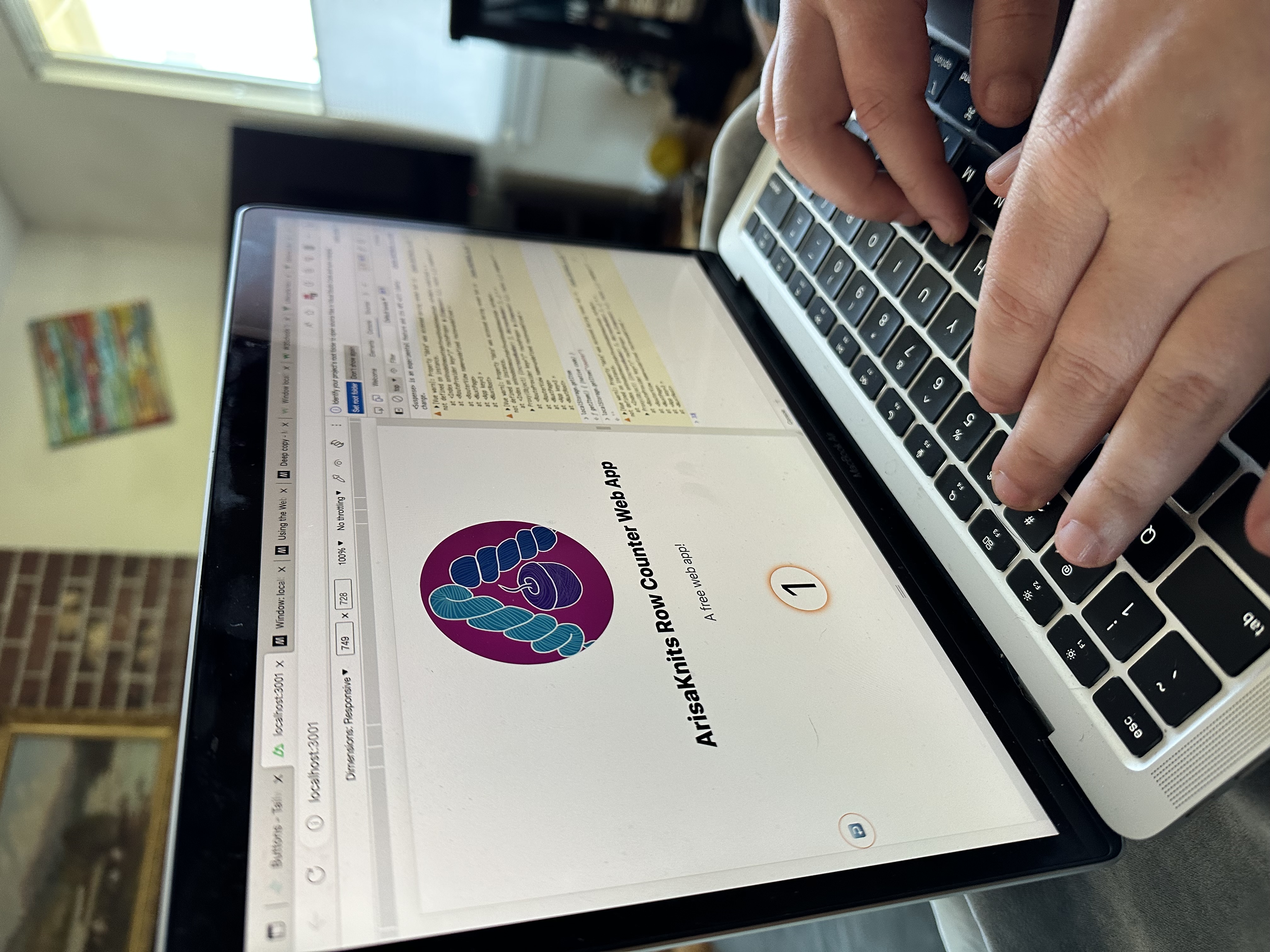Macbook with the row counter web app up on the browser while we test localStorage
